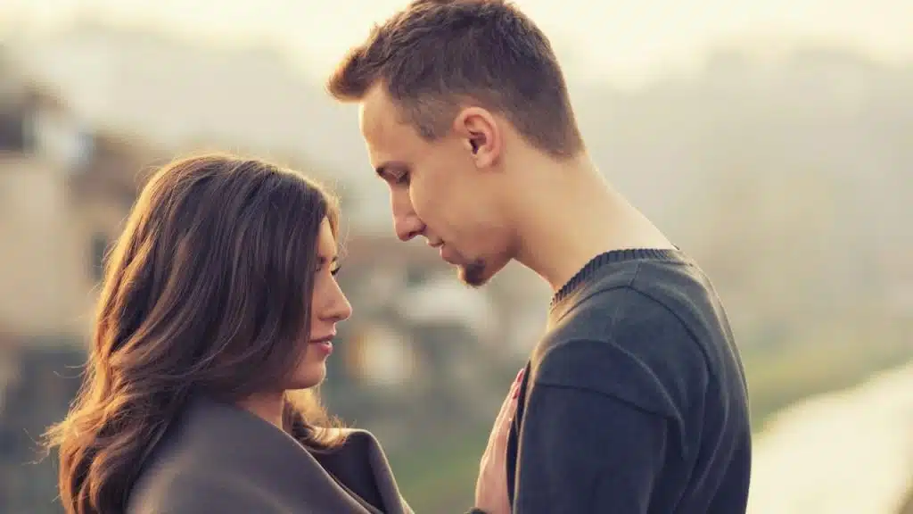 A man looking at a woman