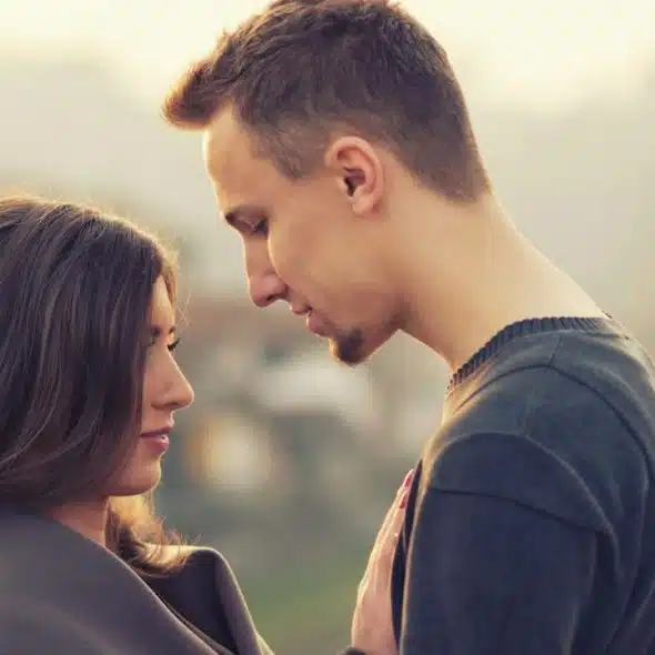 A man looking at a woman