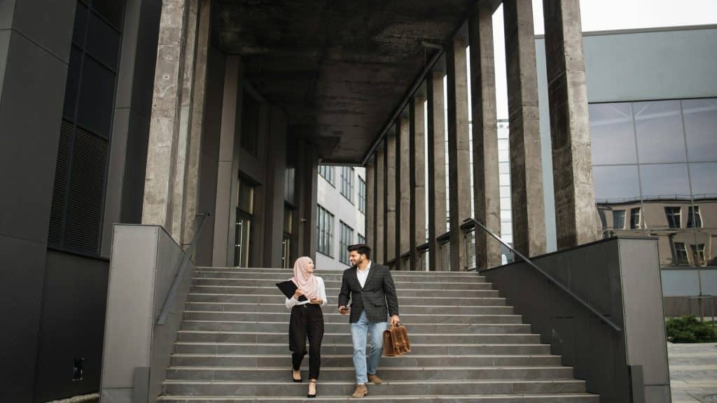 couple walking through city thoughtfully