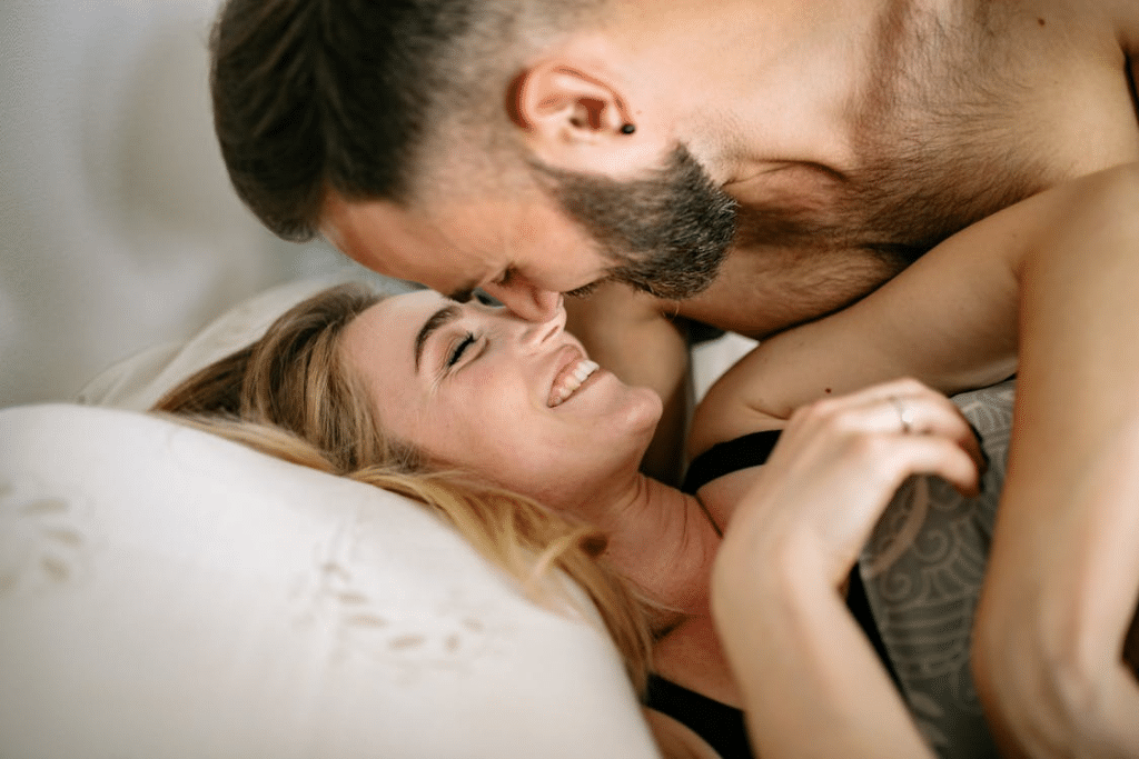 A couple cuddling at home together 