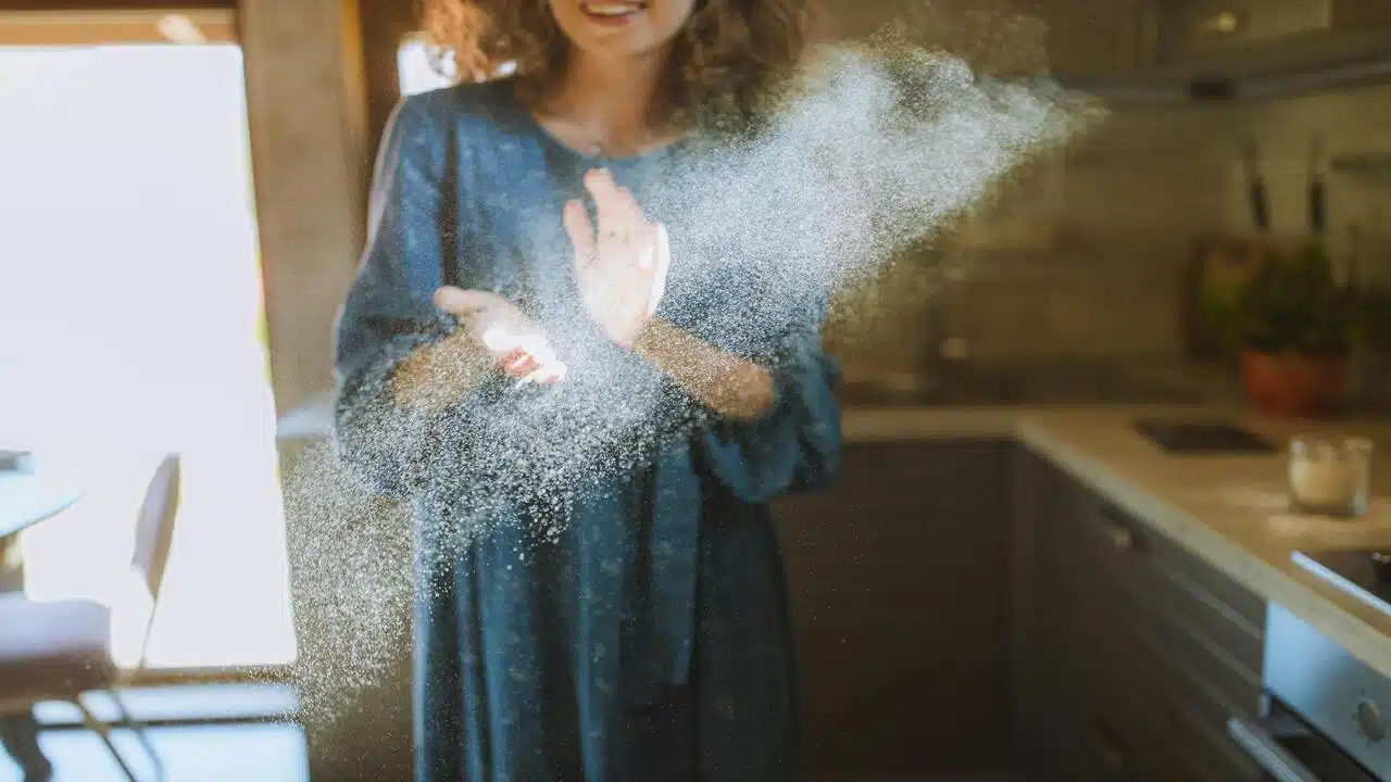 A woman clapping during the day