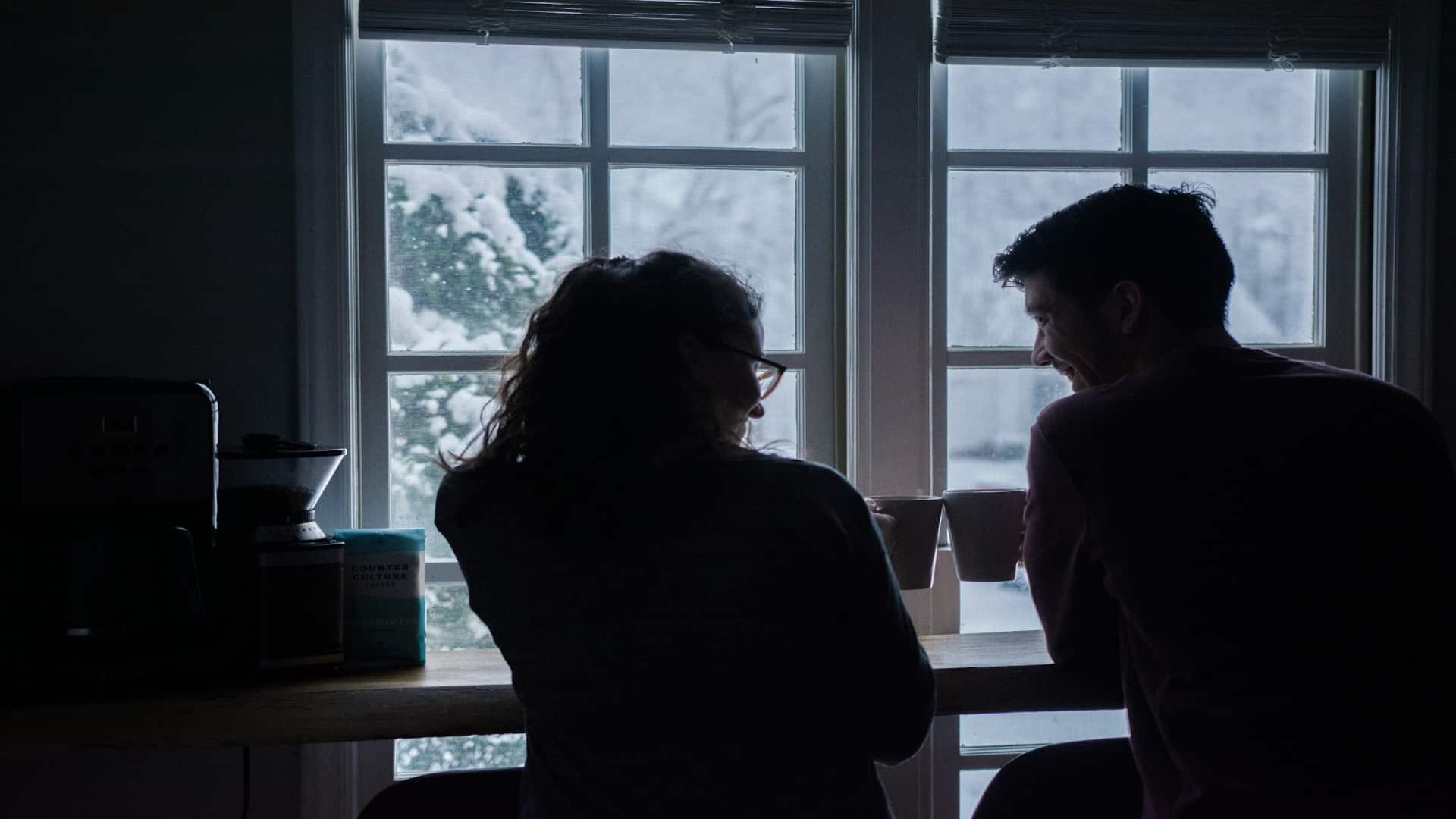 couple talking openly indoors