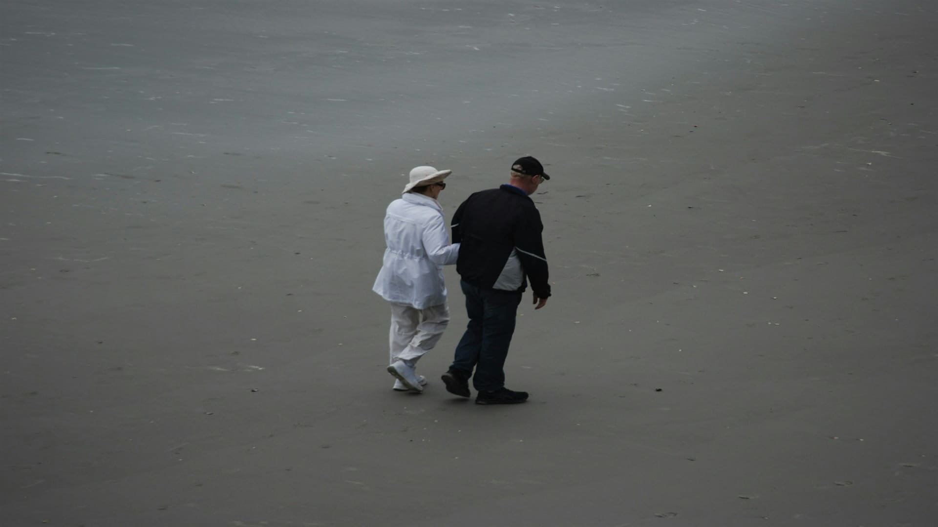 couple walking together thoughtfully