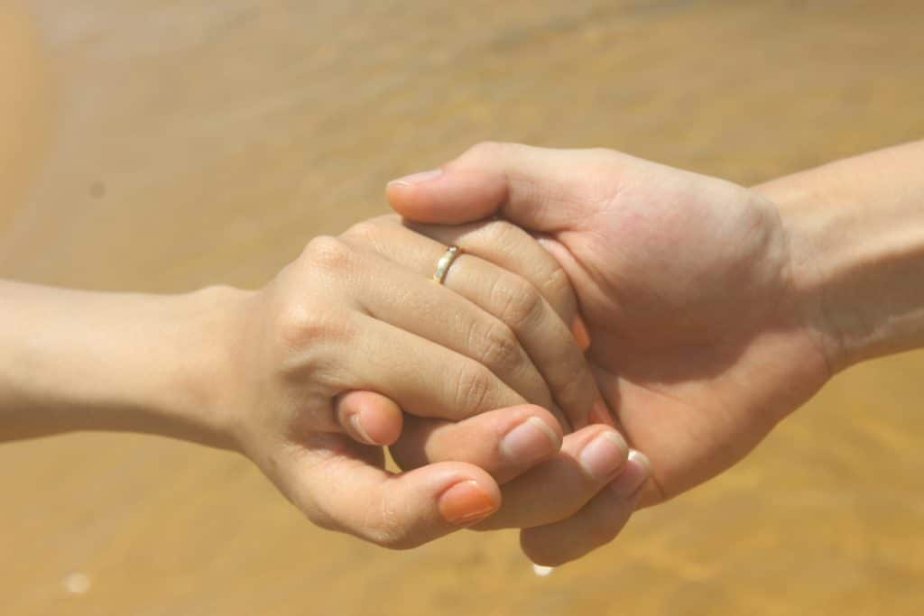 couple holding hands