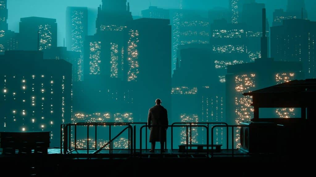 man looking toward city skyline