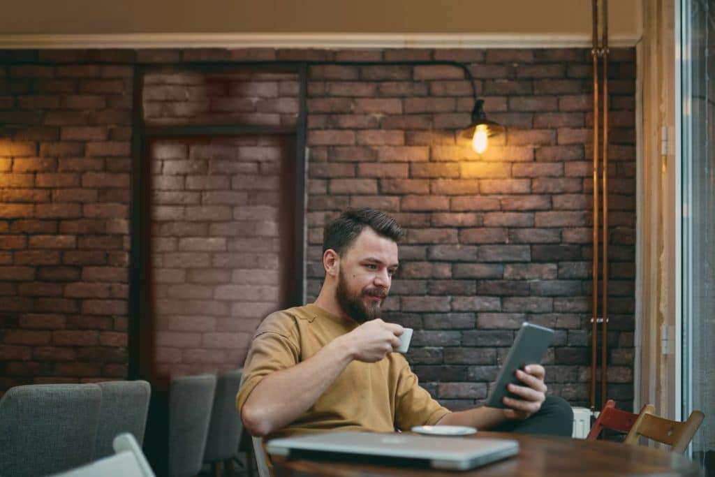 man drinking coffee
