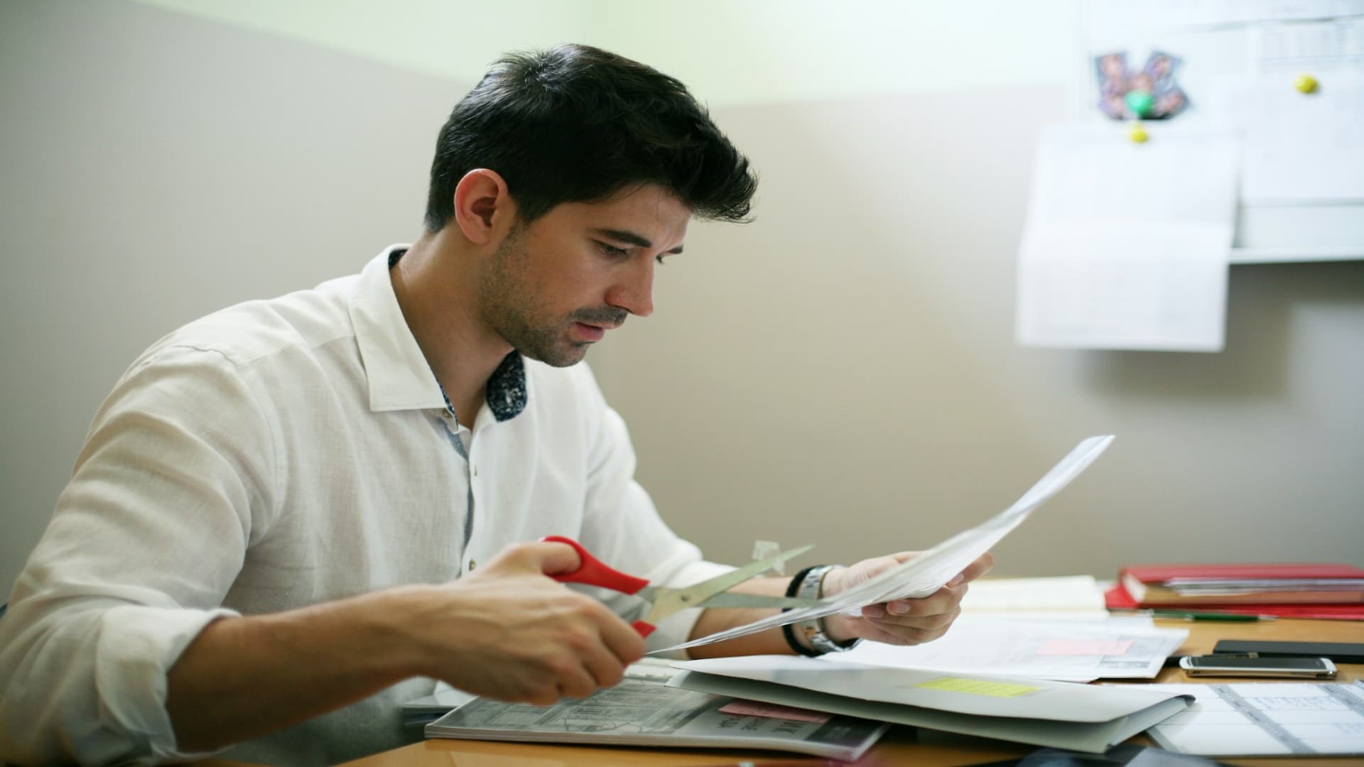 man reviewing busy schedule