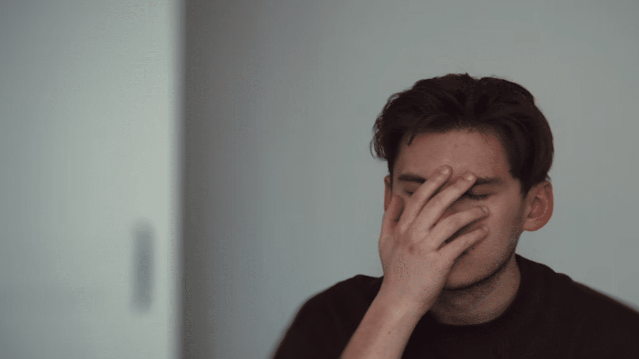 A man face-palming