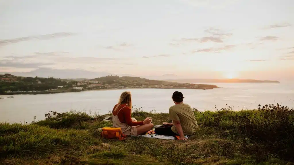 couple watching sunset together
