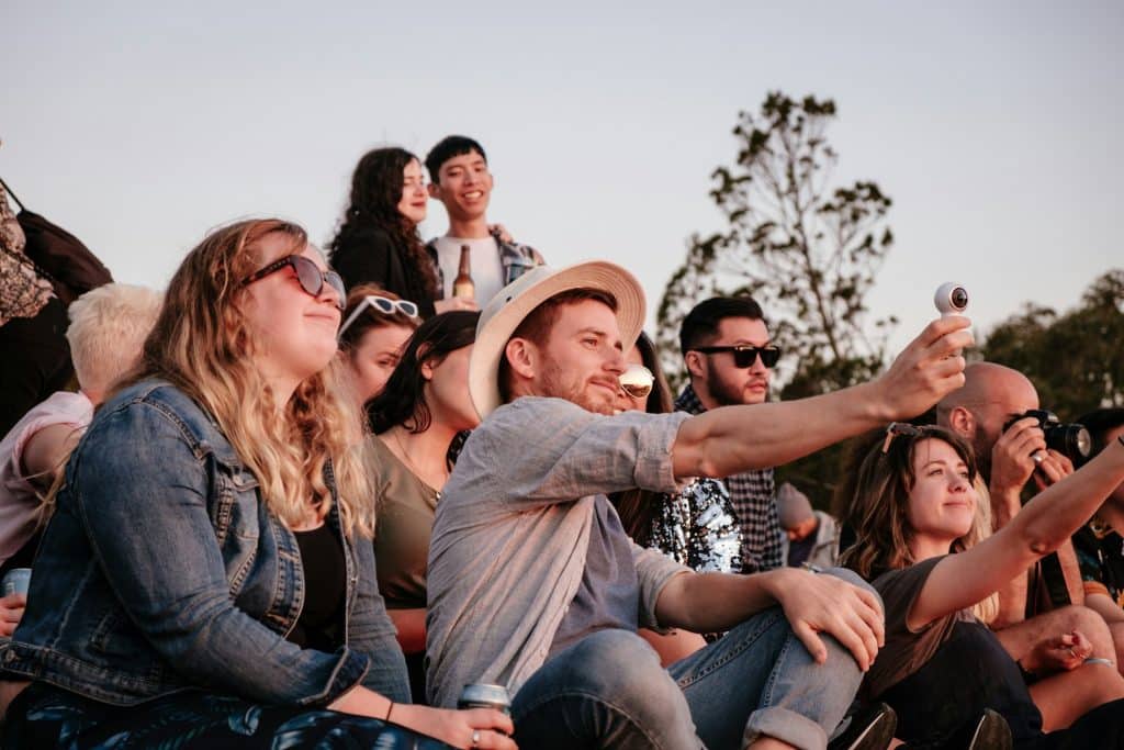 man with friends outdoors