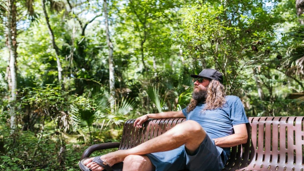 man sitting alone thinking