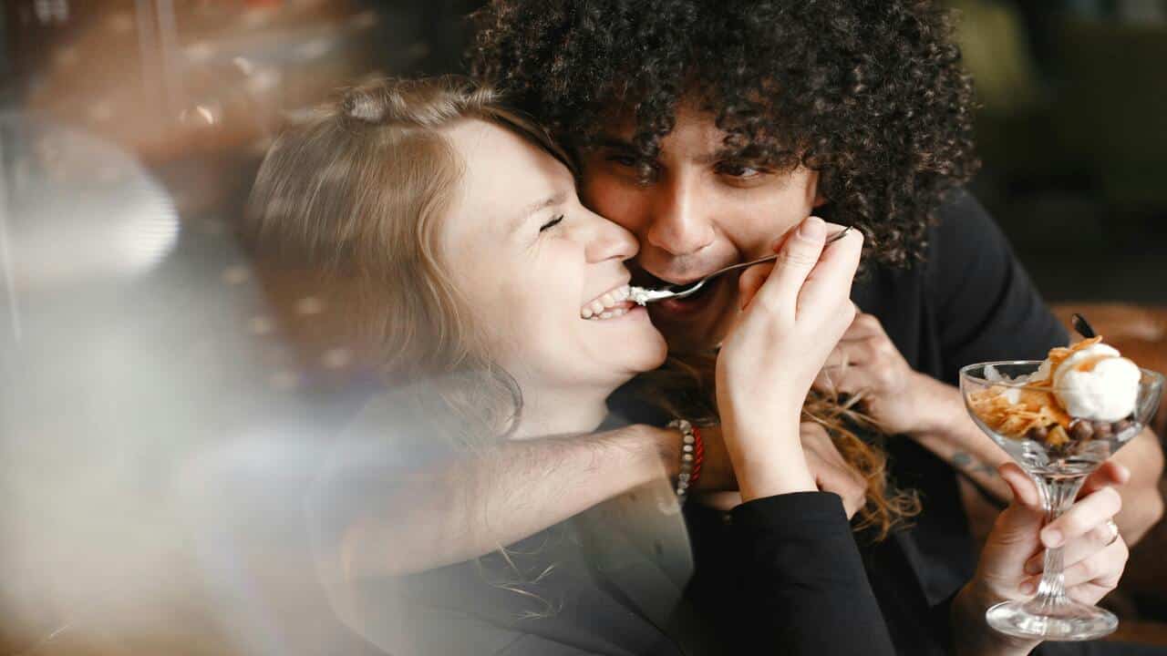 A couple laughing while on a date