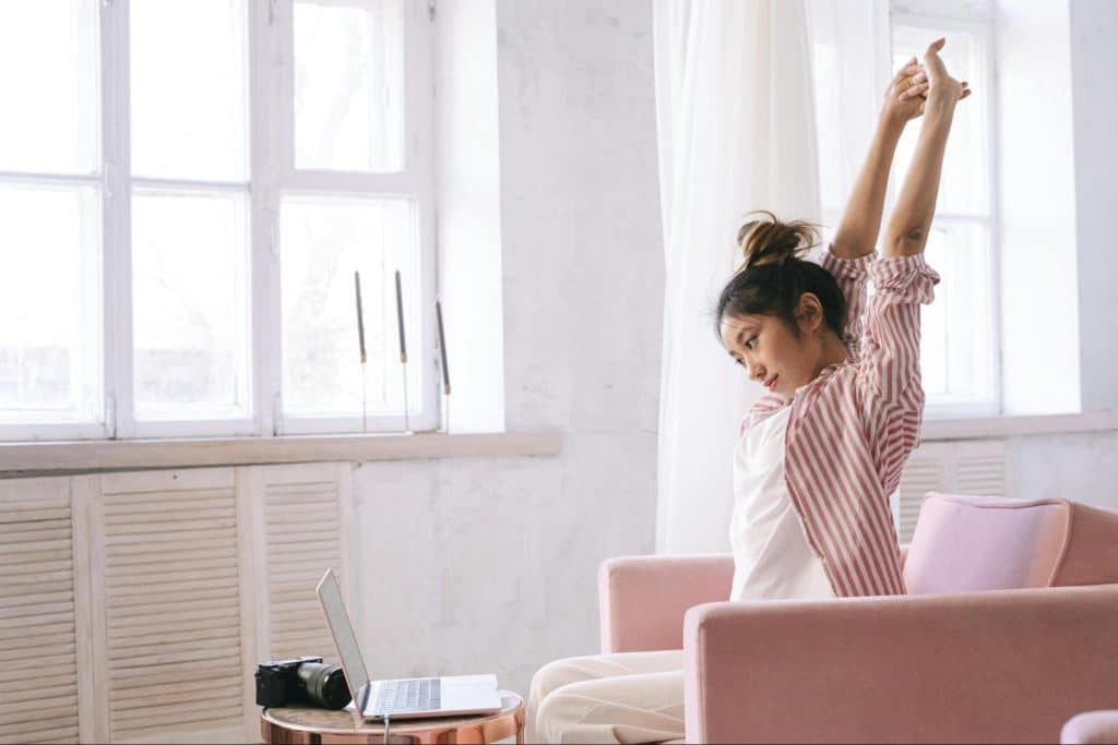 Woman stretching arms