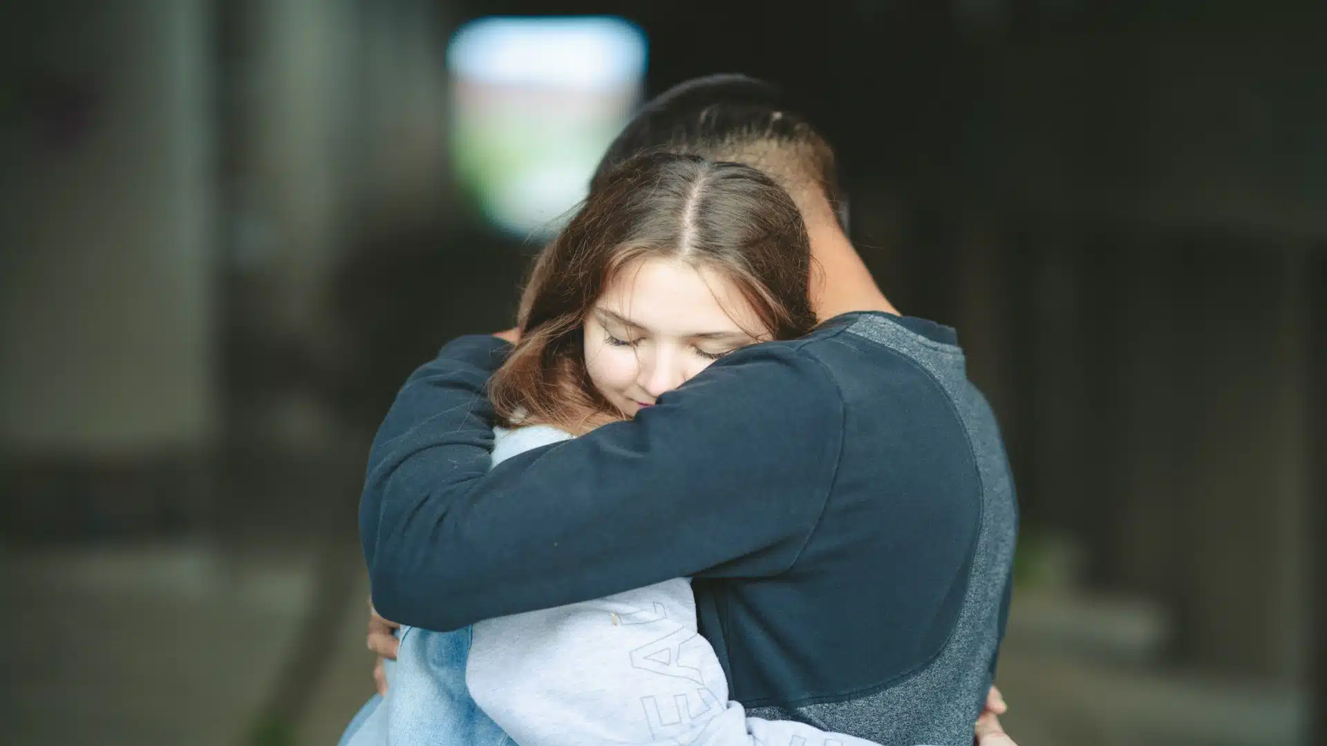 couple comforting each other