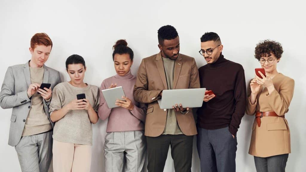 People holding different devices