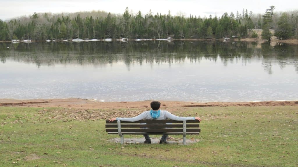 man sitting quietly thinking
