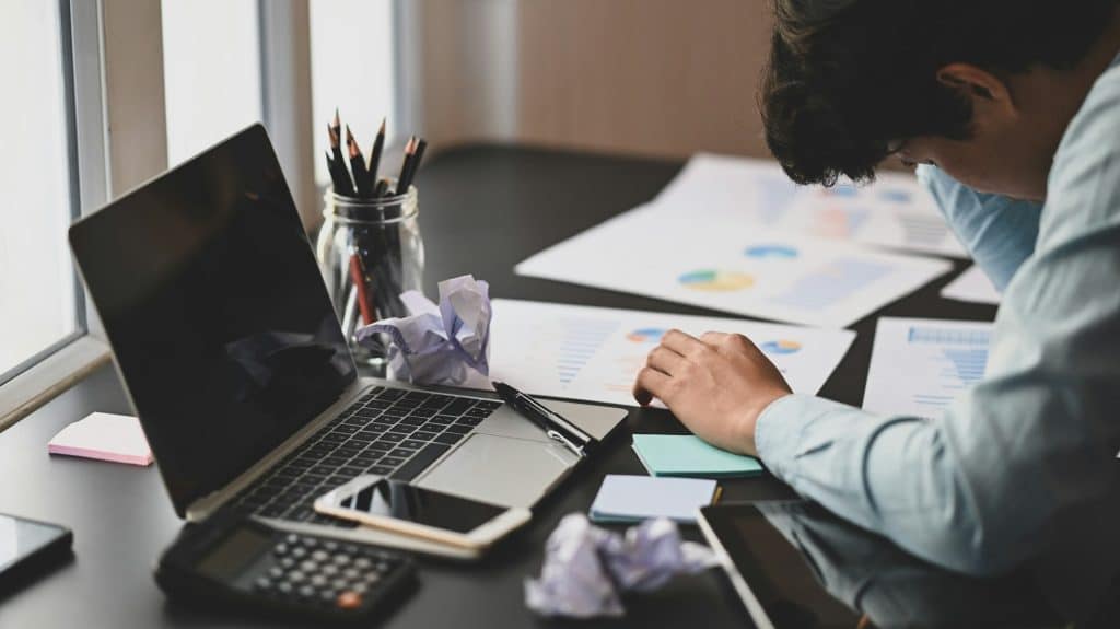 man distracted desk