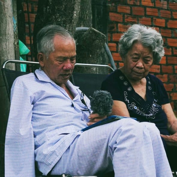 couple sitting quietly together during conversation