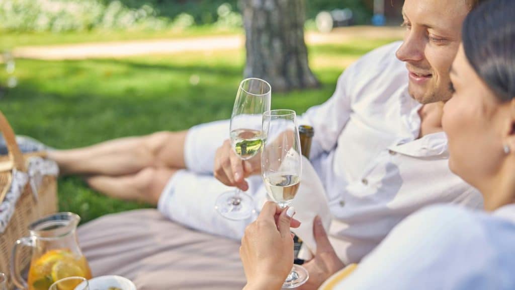 A couple toasting with champagne glasses