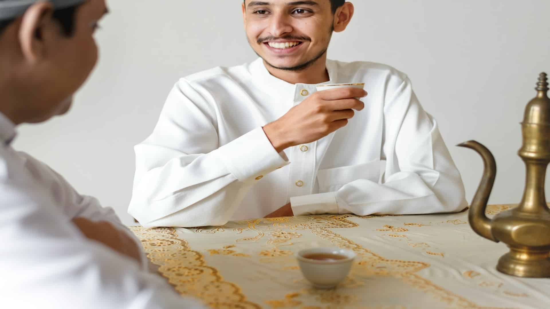 man smiling during conversation
