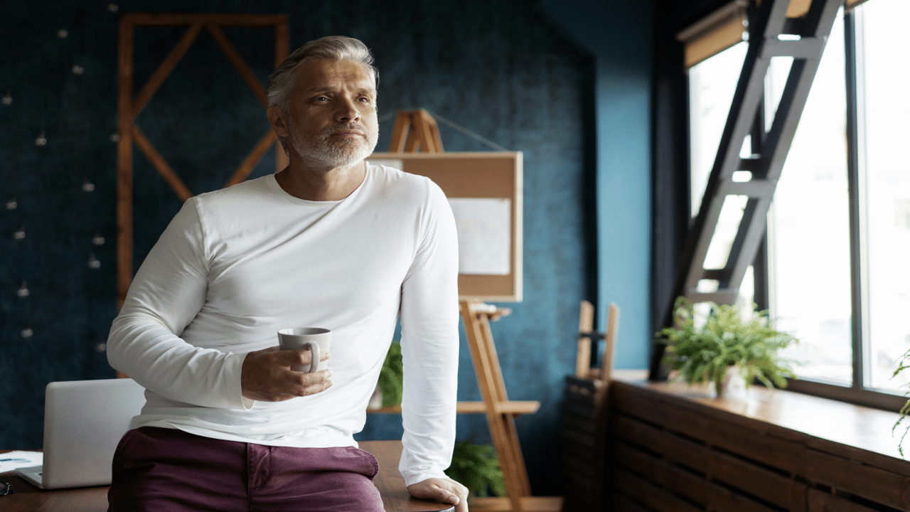 A man having coffee at work