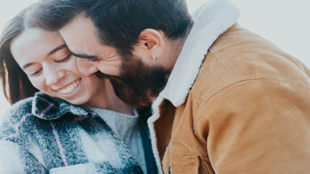 couple smiling warmly at each other