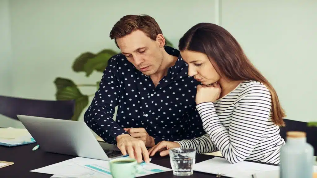 man helping partner with task