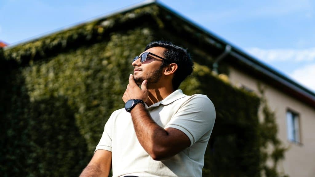 man reflecting outdoors