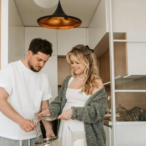 A couple cooking together