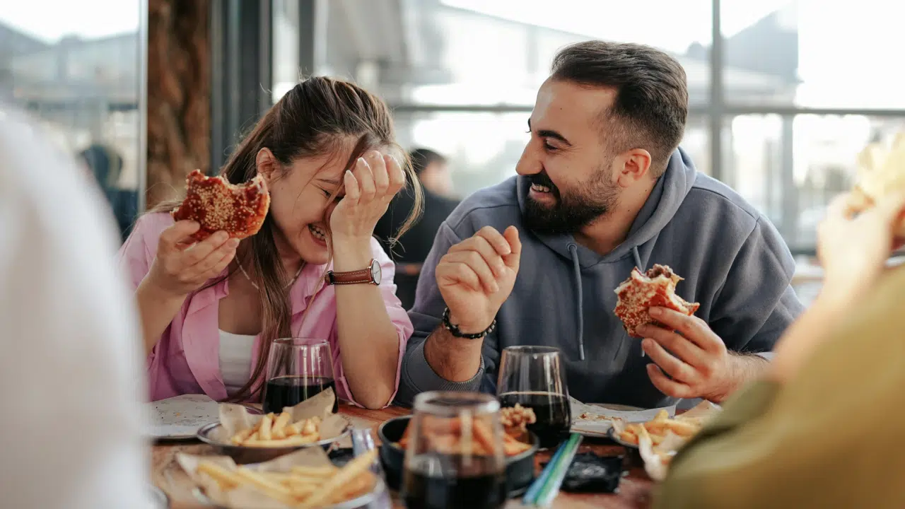 A couple laughing during their date