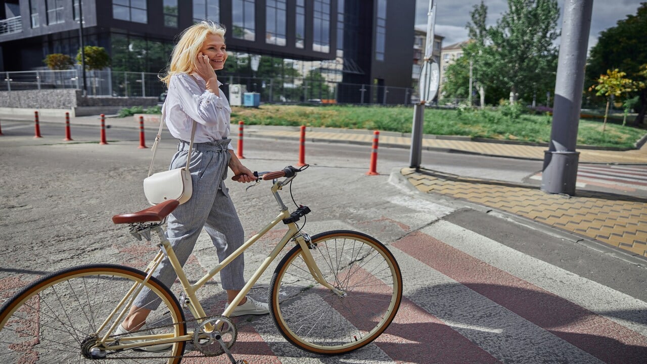 A beautiful woman with a bike