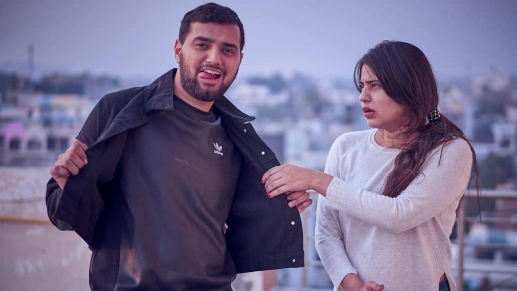 A man is making fun of his girlfriend.