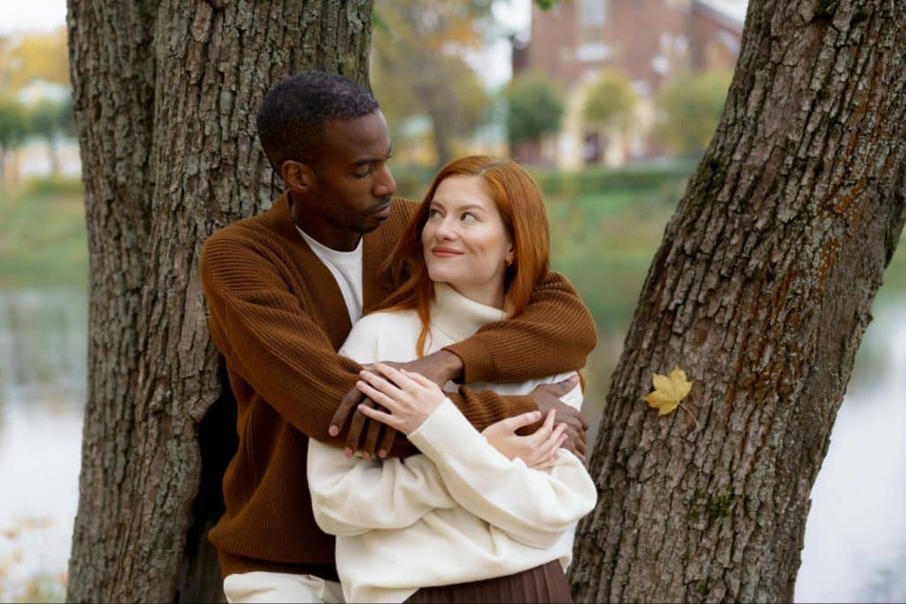 A man hugging a woman