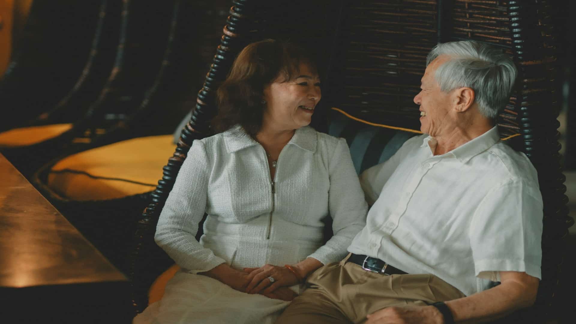 couple having open conversation indoors