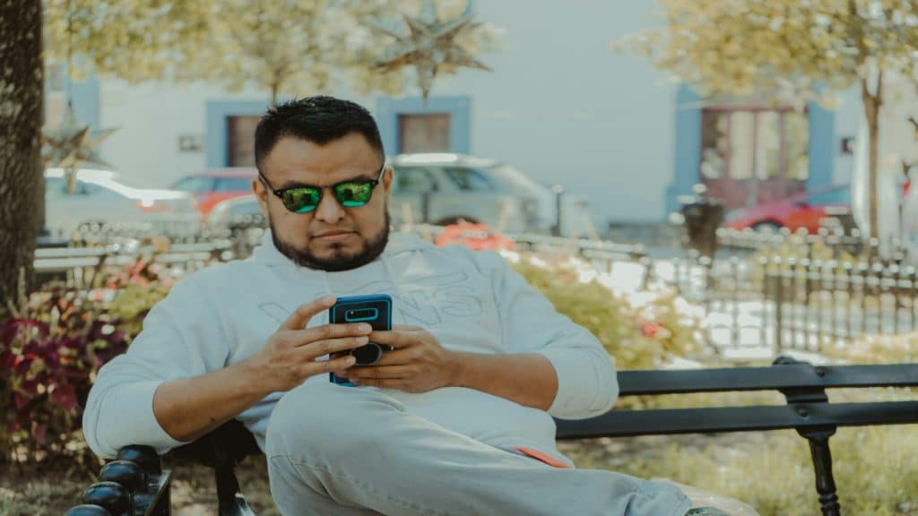 man texting partner