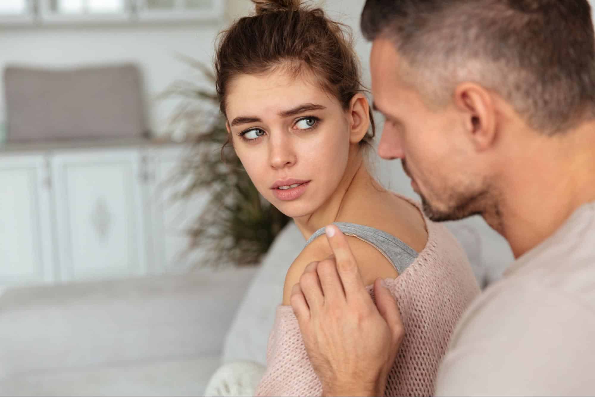 A man trying to speak with woman