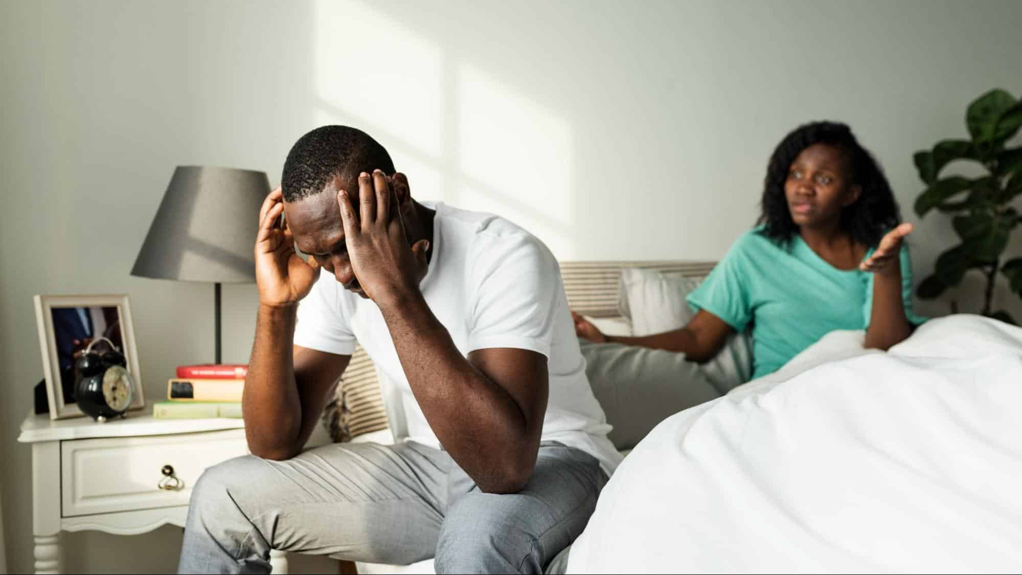 A man turning his back from a woman