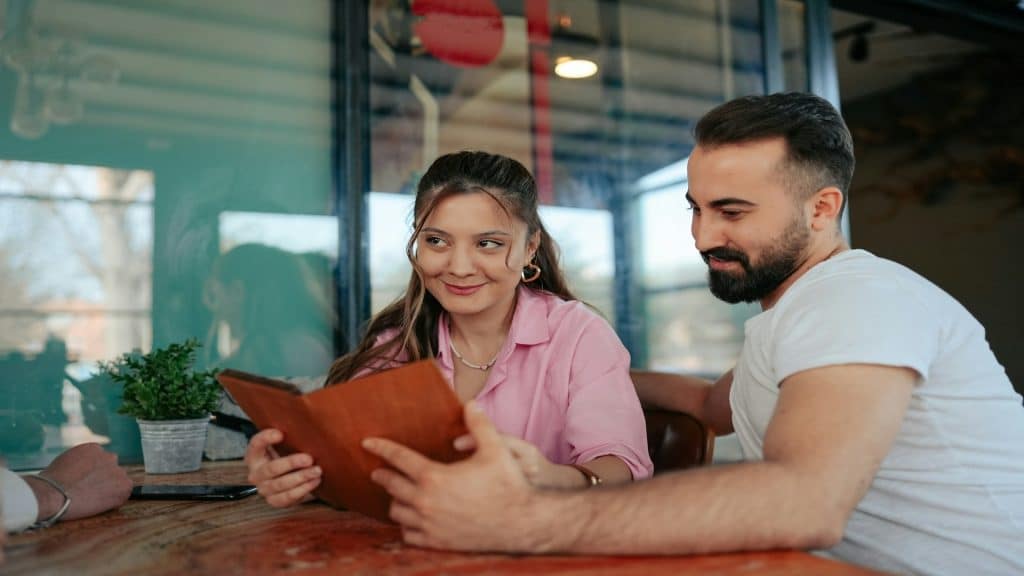man planning date at restaurant