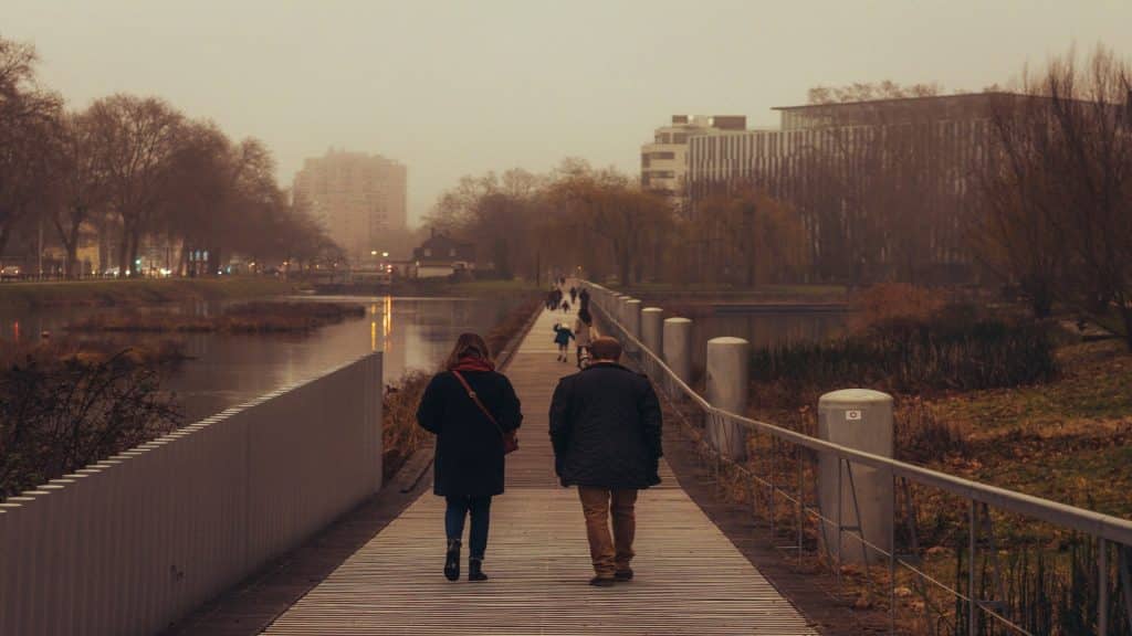 couple walking together during calm conversation