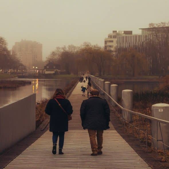 couple walking together during calm conversation