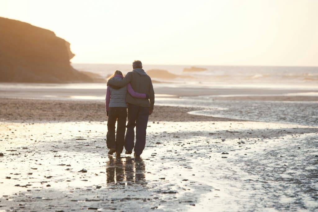 couple walking sunset