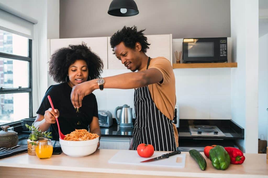 couple cooking together