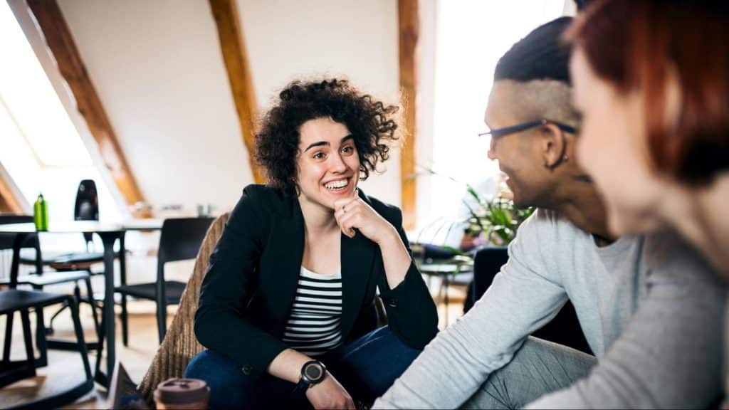 Woman talking to her colleagues