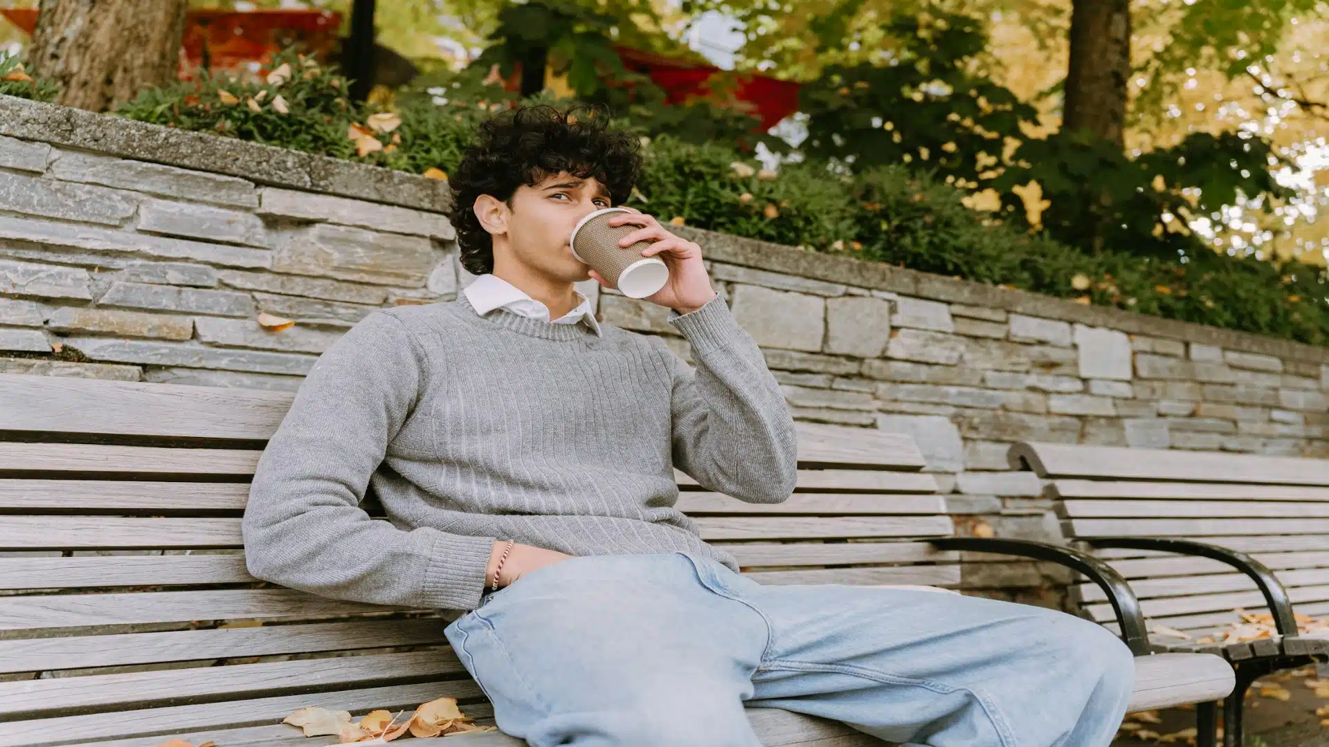 man thinking quietly outdoors