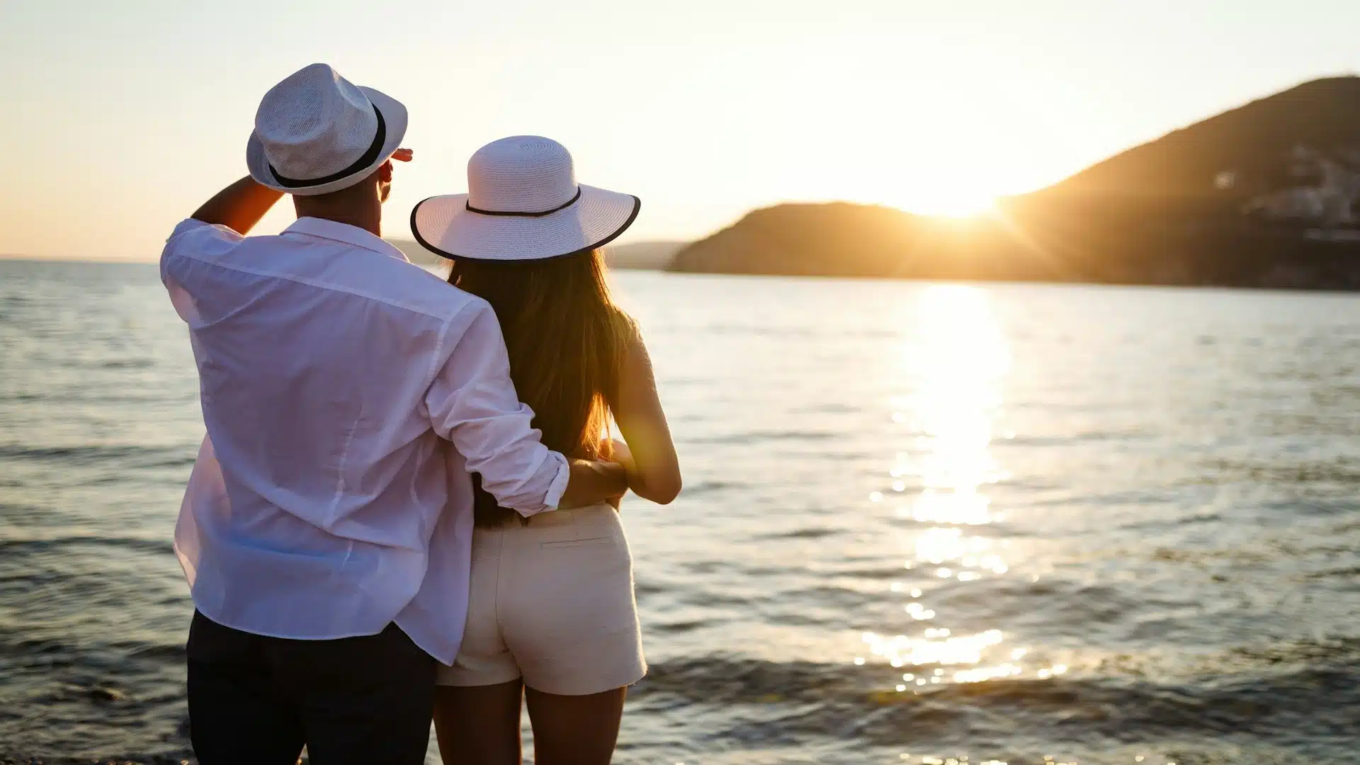 couple watching sunset together