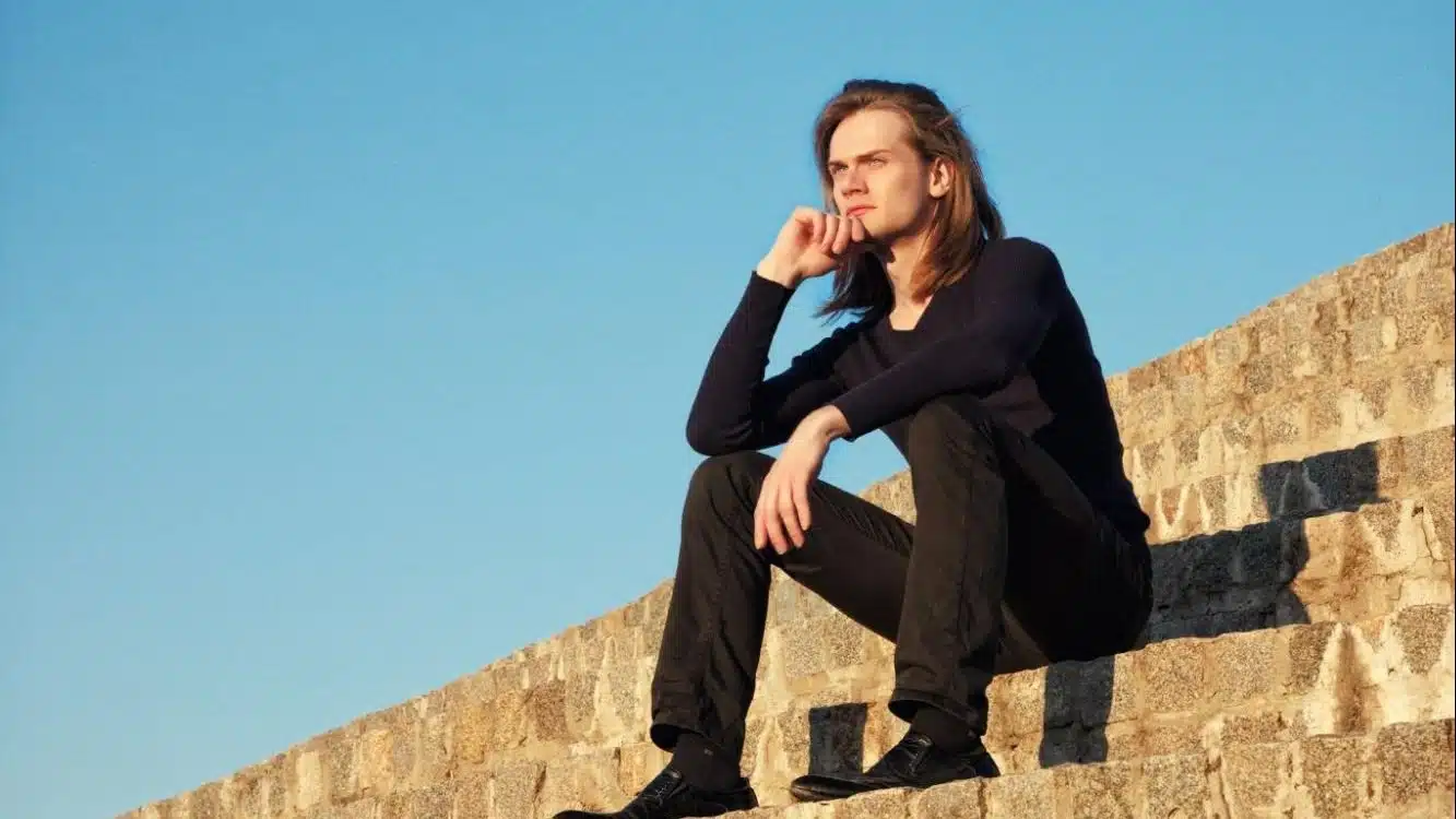pensive man sunset