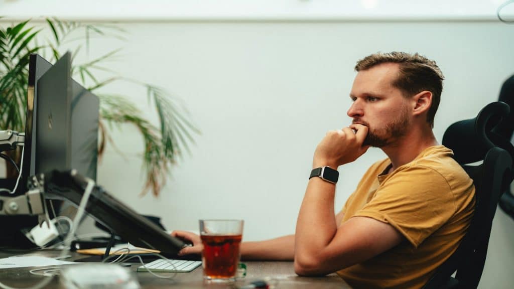 man working calmly at desk