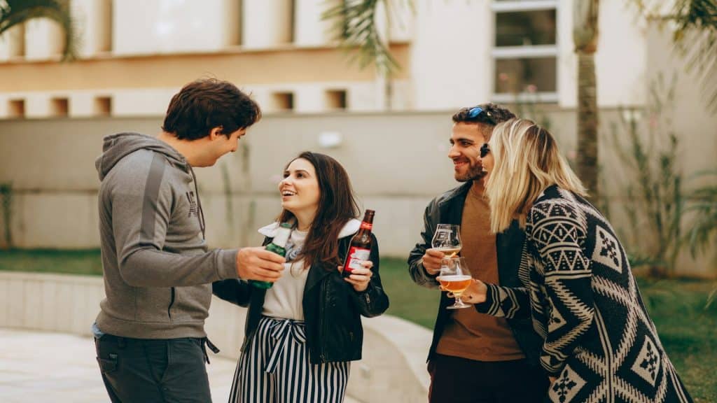 couple socializing with others