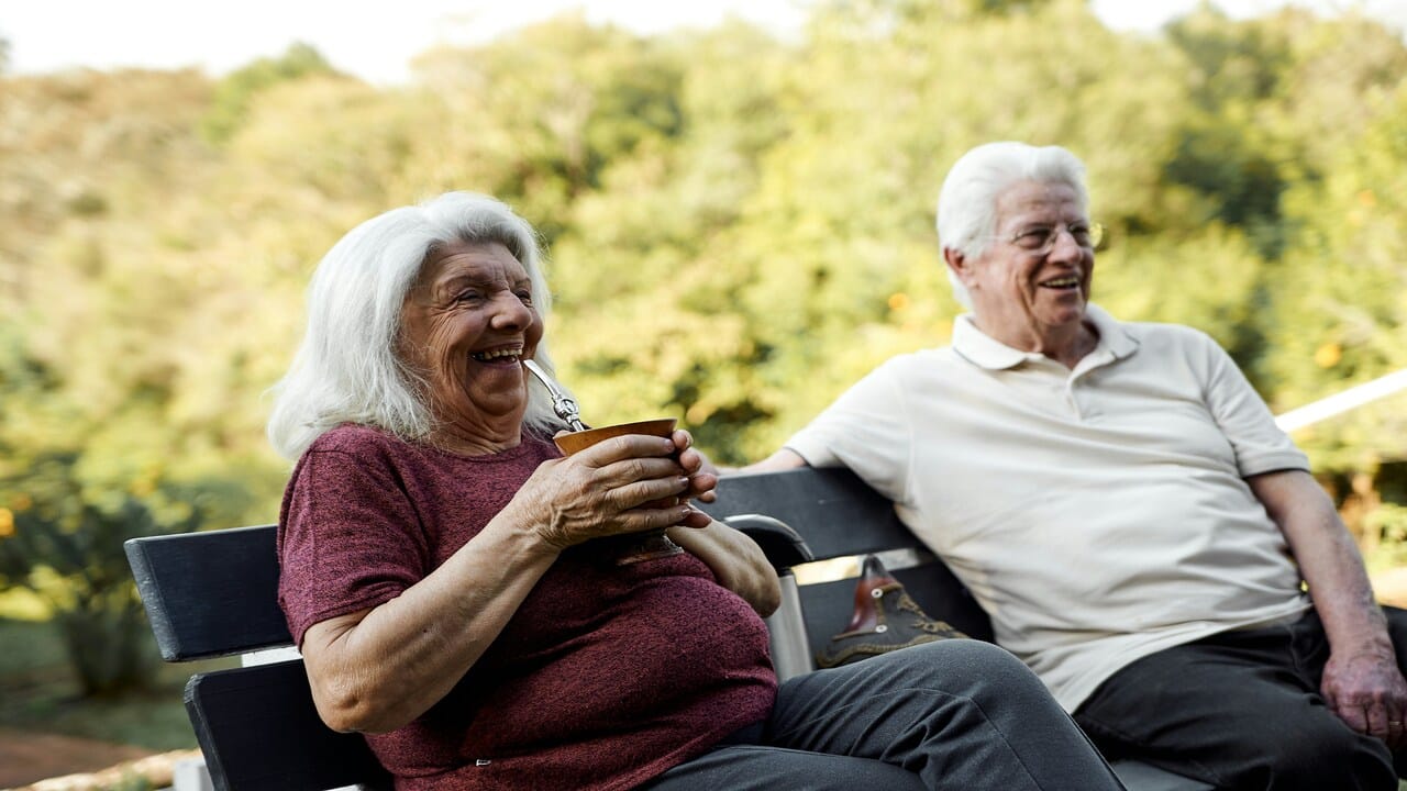 Grandparents sitting on a bench
