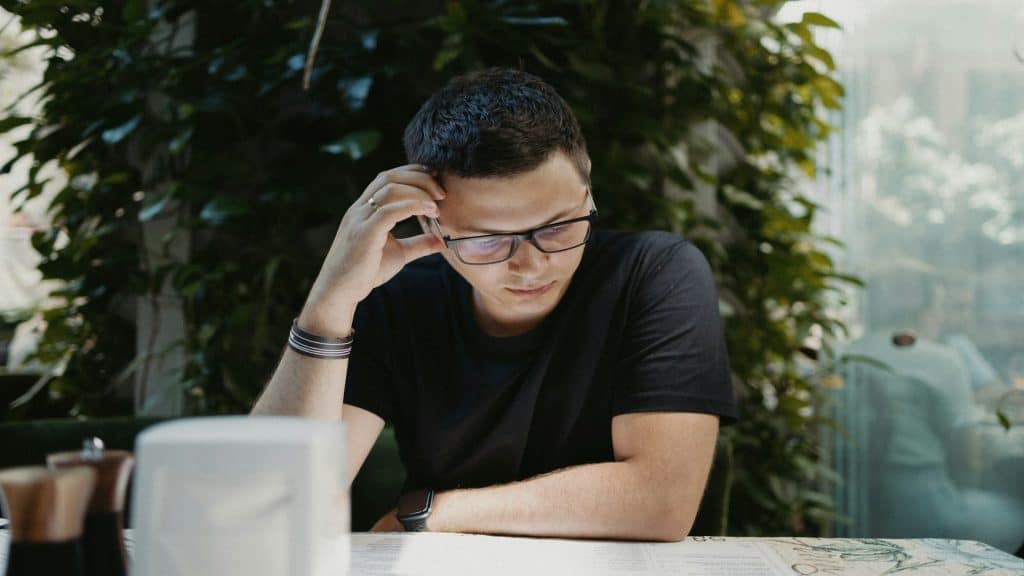 man focused while thinking